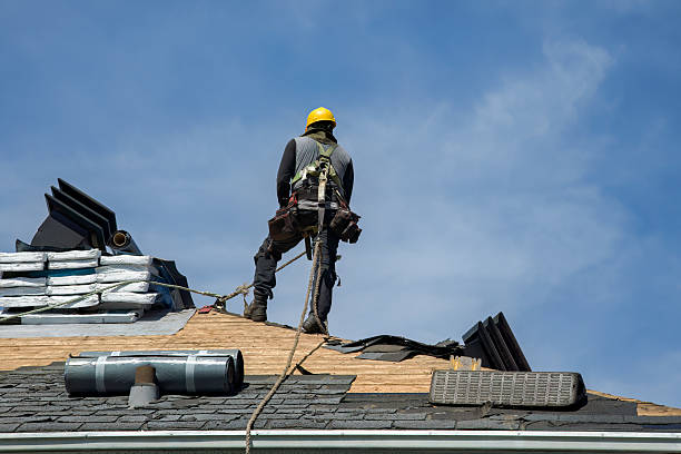 Professional Roof Replacement technician working in Adena, OH